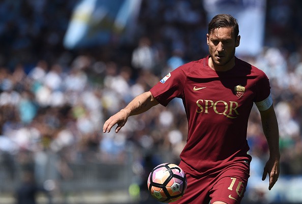Roma's forward from Italy Francesco Totti controls the ball during the Italian Serie A football match Roma vs Lazio at the Olympic Stadium in Rome on April 30, 2017.  / AFP PHOTO / FILIPPO MONTEFORTE        (Photo credit should read FILIPPO MONTEFORTE/AFP/Getty Images)
